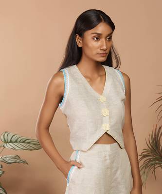 Beige crop top with medium broad pants with abstract print long jacket 3