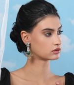 Antique dual-tone tribal earrings with green stone