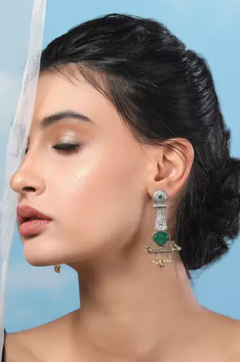 Antique dual-tone tribal earrings with green stone