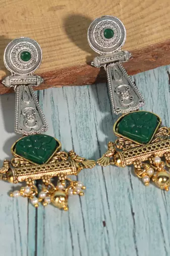 Antique dual-tone tribal earrings with green stone