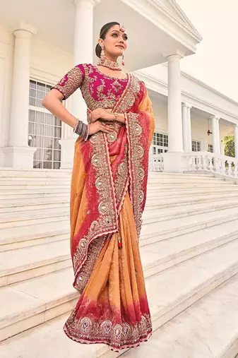 Crepe jacquard rust color embroidered saree