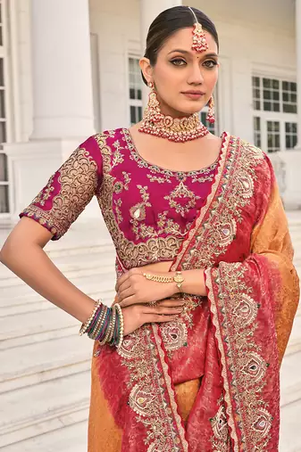 Crepe jacquard rust color embroidered saree