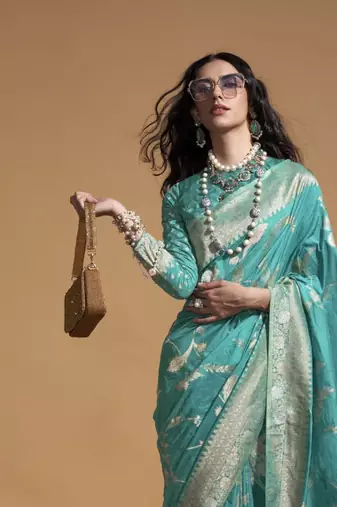 Women zari woven saree with tassels