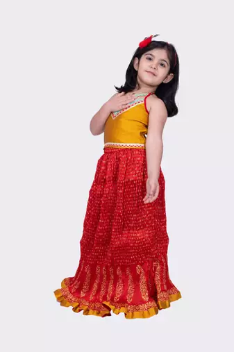 Twisha mustard & red halter neck jacquard top and art silk crushed ghaghra