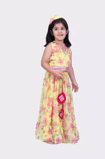 Twisha yellow sleeveless floral printed v neck back open ghaghra choli 