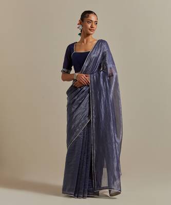A blue chanderi striped saree with pearl lace detailing 1