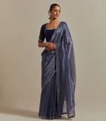 A blue chanderi striped saree with pearl lace detailing