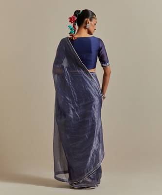 A blue chanderi striped saree with pearl lace detailing 5