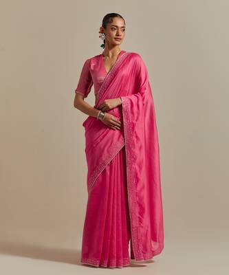 Embroidered chanderi saree paired with a striped blouse 1