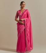 Embroidered chanderi saree paired with a striped blouse