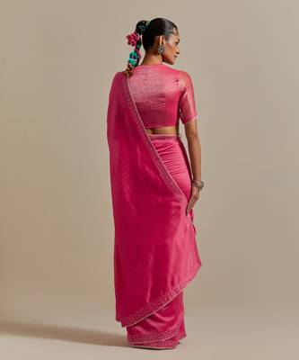 Embroidered chanderi saree paired with a striped blouse 3
