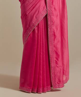 Embroidered chanderi saree paired with a striped blouse 4