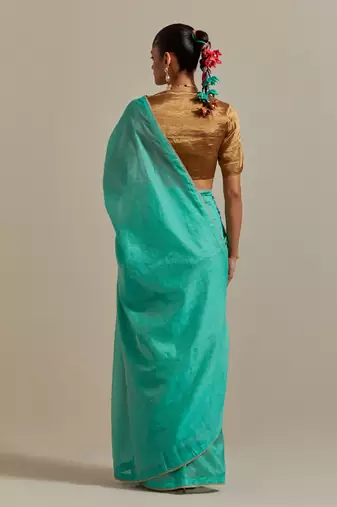 The aqua gold stripes saree