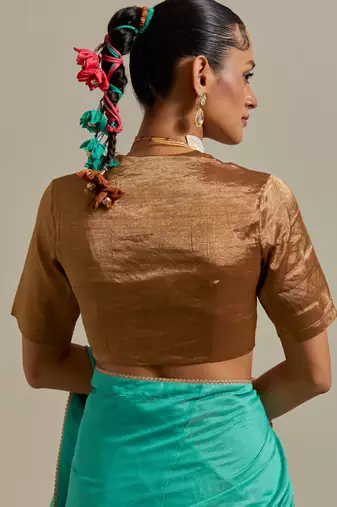 The aqua gold stripes saree