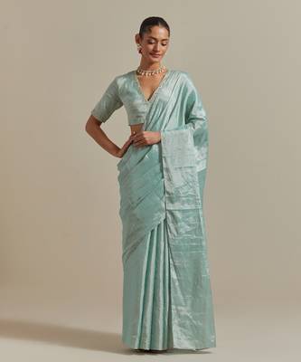 The elegant and subtle mint zari silk saree 1