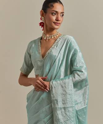 The elegant and subtle mint zari silk saree 3