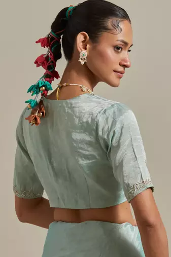 The elegant and subtle mint zari silk saree