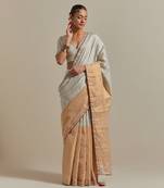 A colour-block saree with silver and gold zari