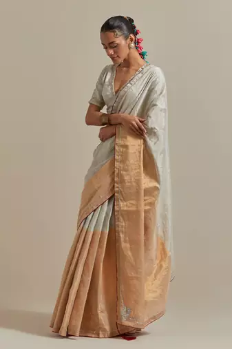 A colour-block saree with silver and gold zari