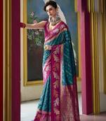 Kimisha teal silk blend banarasi saree with unstitched blouse piece