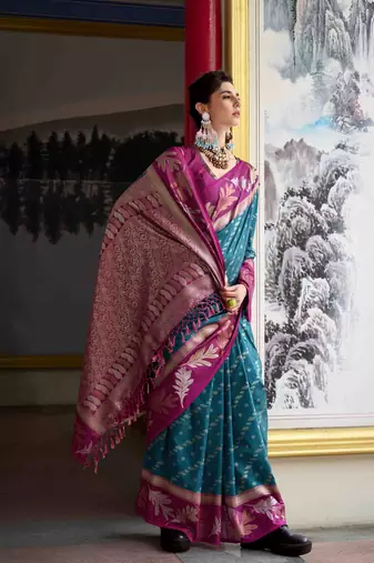 Kimisha teal silk blend banarasi saree with unstitched blouse piece