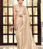 Kimisha women's beige silk blend kanjeevaram saree with unstitched blouse piece