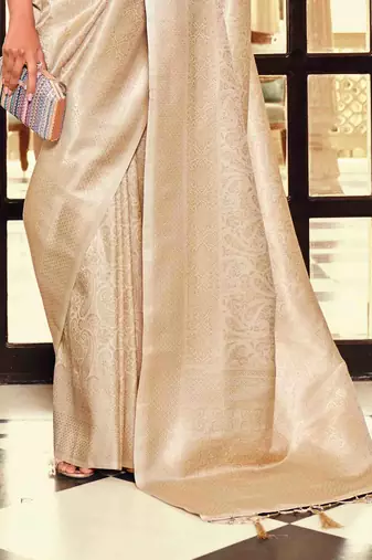 Kimisha women's beige silk blend kanjeevaram saree with unstitched blouse piece