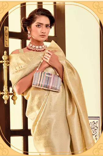 Kimisha women's cream silk blend kanjeevaram saree with unstitched blouse piece
