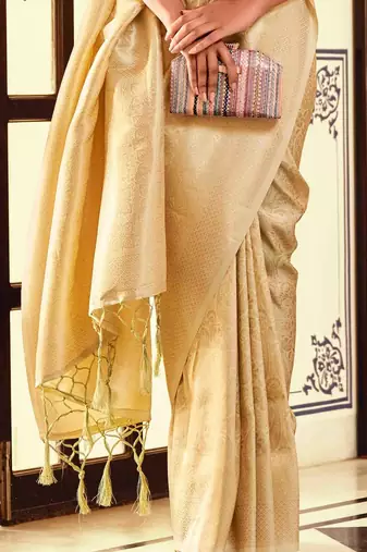 Kimisha women's cream silk blend kanjeevaram saree with unstitched blouse piece