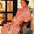 Kimisha women's peach silk blend kanjeevaram saree with unstitched blouse piece
