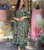 Green beautiful cotton flower printed neckline worked kurta and palazzo with cotton dupatta