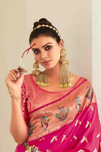 Women's pink georgette banarasi saree with unstitched blouse piece