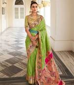 Women's parrot green georgette banarasi saree with unstitched blouse piece
