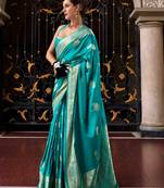 turquoise satin zari woven saree with unstitched blouse piece