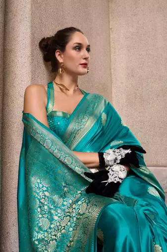 turquoise satin zari woven saree with unstitched blouse piece