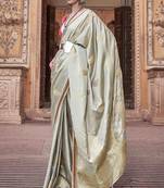 mint satin zari woven saree with unstitched blouse piece