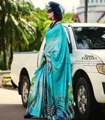 turquoise satin print saree with unstitched blouse piece