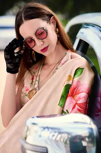 beige satin print saree with unstitched blouse piece