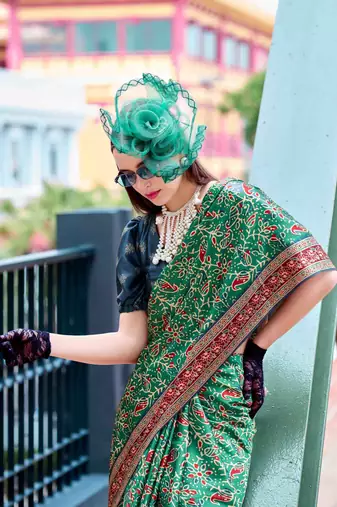Women's green satin print saree with unstitched blouse piece