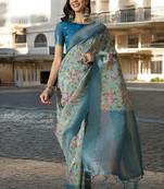 Women's blue poly silk saree with unstitched blouse piece
