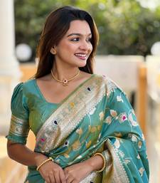 Light Sea Green Banarasi Art Silk Saree With Zari Weaving Design