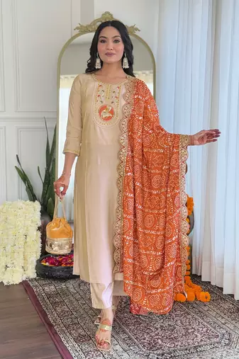 Beige bsy viscosee fabric looks graceful readymade suit for girls