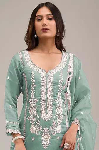 Green cotton fabric embroidery work ceremonial salwar kameez