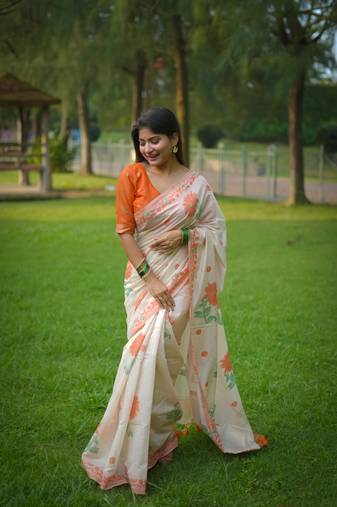 Orange soft muga cotton with jamdani weaving and resham weaving buttas saree with unstitched blouse