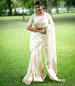 White soft banarasi silk blend zari weaving saree with unstitched blouse