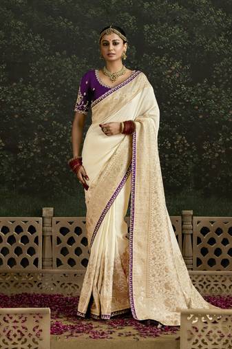 Off White Dola Silk Weaving With Sequnice Work Border & Heavy Designer Contras Blouse