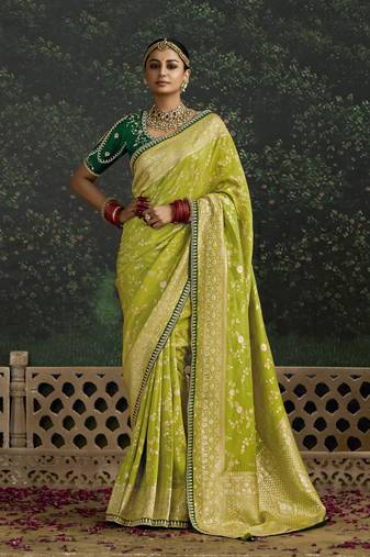 Parrot Green Dola Silk Weaving With Sequnice Work Border & Heavy Designer Contras Blouse