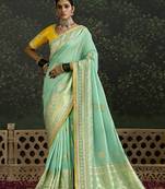 Turquoise Dola Silk Weaving With Sequnice Work Border & Heavy Designer Contras Blouse