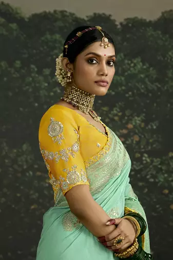Turquoise Dola Silk Weaving With Sequnice Work Border & Heavy Designer Contras Blouse