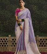 Lavender Dola Silk Weaving With Sequnice Work Border & Heavy Designer Contras Blouse